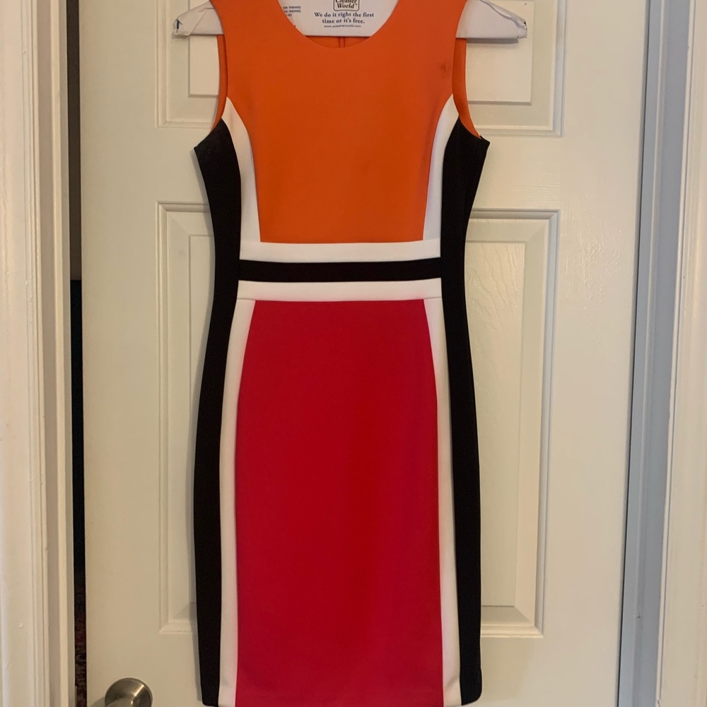 Gorgeous Calvin Klein sheath dress. Scuba material.  Great for office.